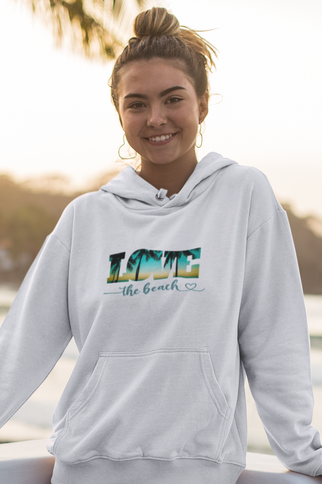 http://myweekendtees.com/cdn/shop/products/CROPPEDhoodie-mockup-of-a-smiling-woman-posing-at-sunset-26781.png?v=1670777056