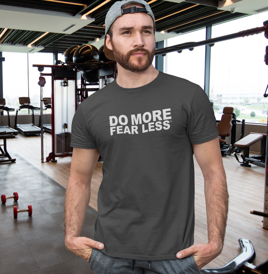 Man at gym wearing My Weekend Tee Shirt with quote Do More Fear Less