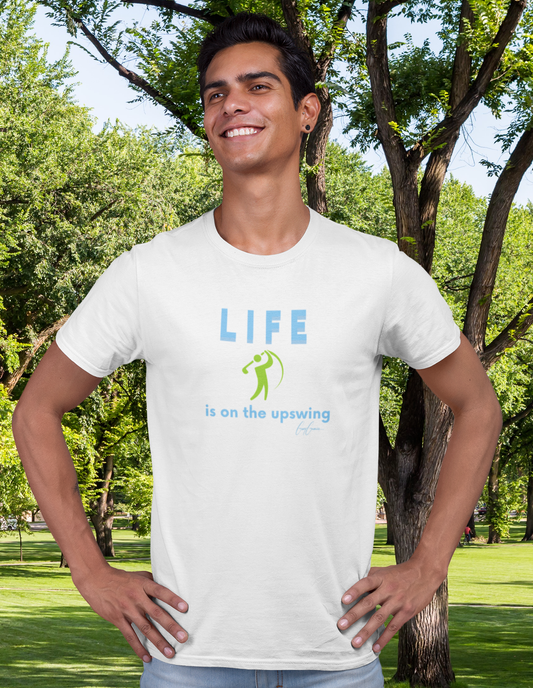 Man wearing white t-shirt with Life is on the upswing quote 