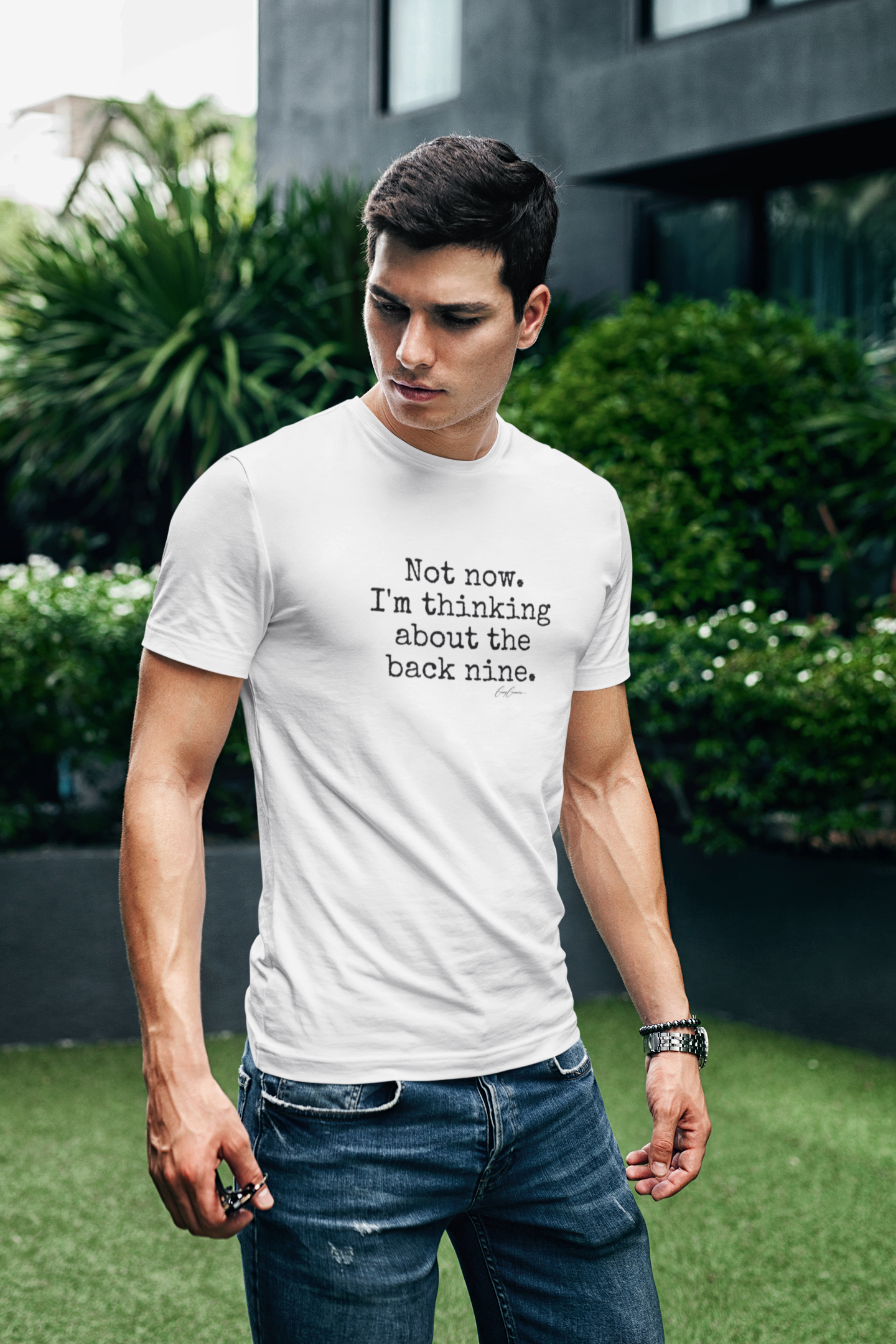 Attractive man wearing a My Weekend Tees shirt with text quote Not now. I'm thinking about the back nine.