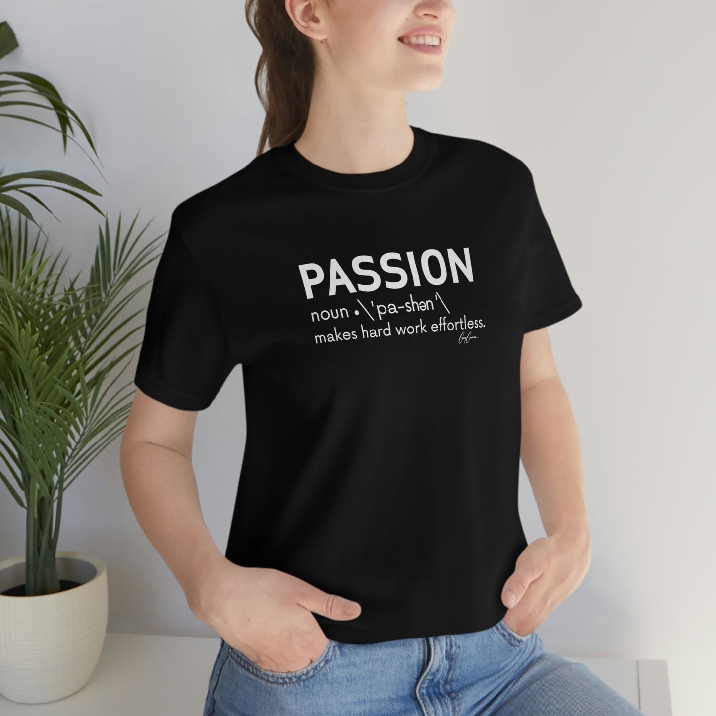 Female wearing inspirational tee shirt with Passion quote