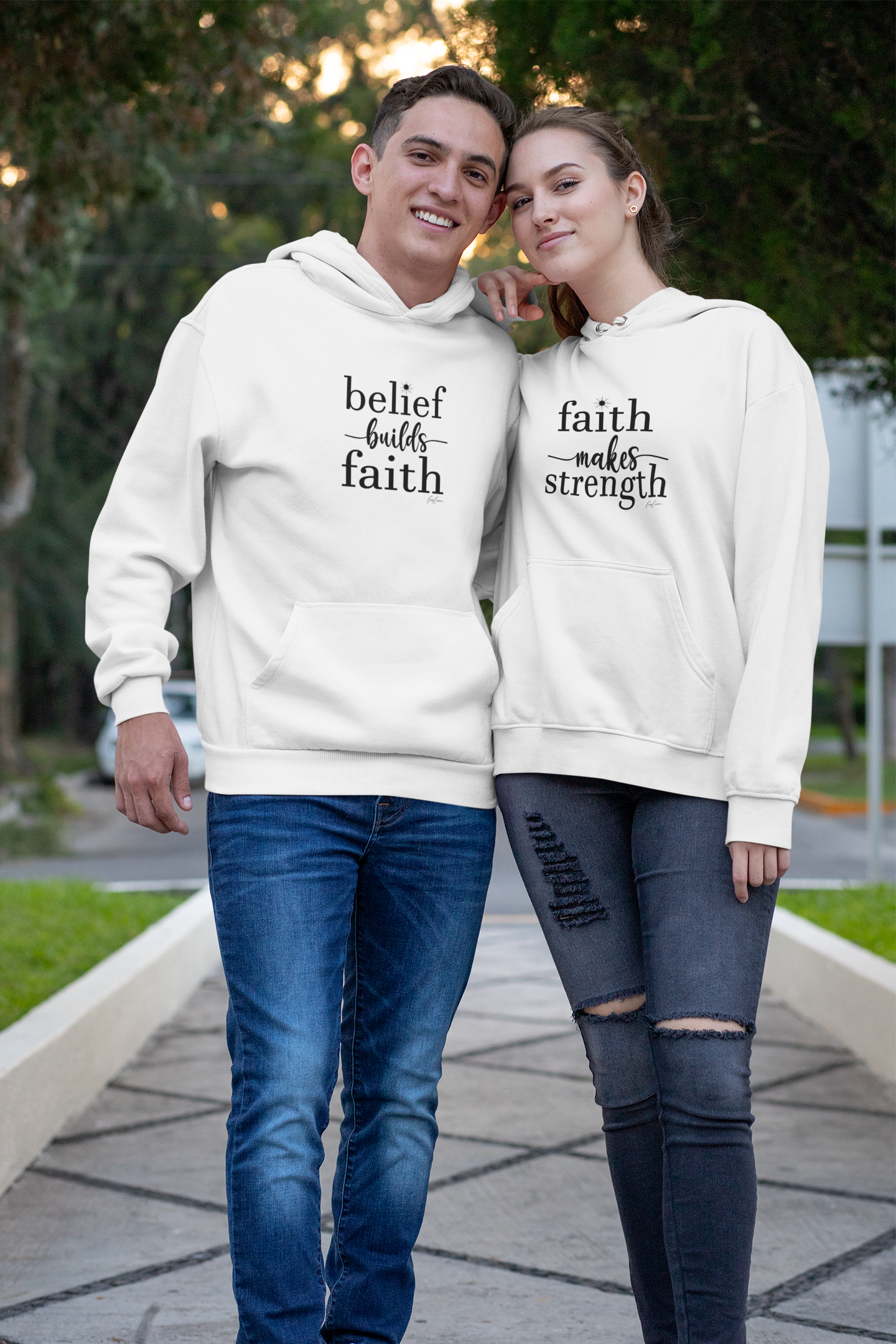 man-and-woman-wearing-motivational-hoodies-with-quotes-about-faith